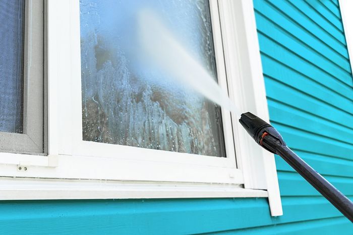 spraying water in the window