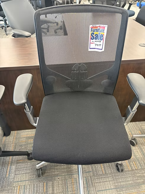Black mesh office chair with gray arms and wheels; a 