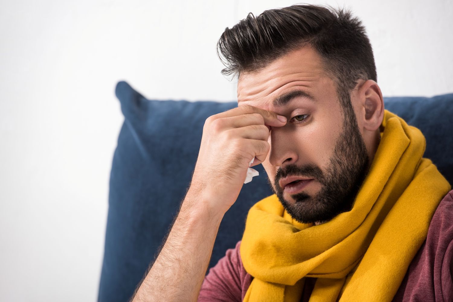 close-up-portrait-of-sick-young-man-with-sinus-infection
