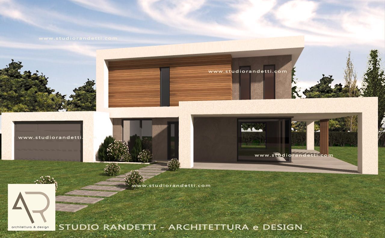 Esterno di una moderna casa a due piani con struttura bianca, pannelli in legno e un prato verde sotto un cielo azzurro.