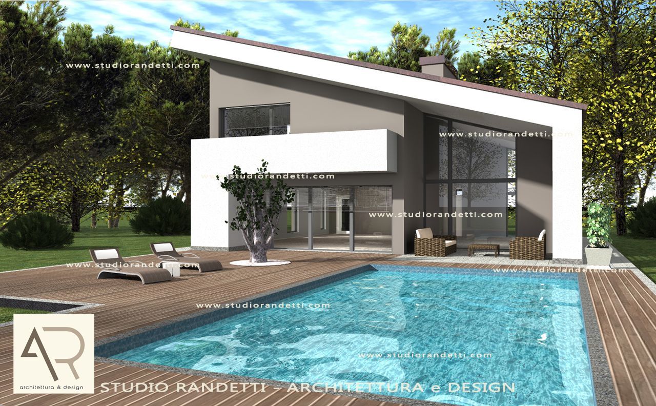 Casa moderna bianca con tetto spiovente accanto a una piscina blu e a un giardino verde.