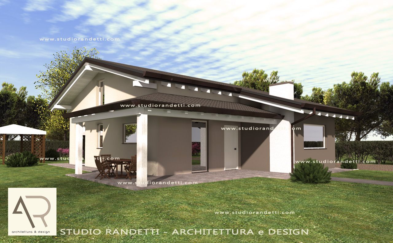 Esterno di una moderna casa a un solo piano con pareti beige, tetto scuro e prato verde sotto un cielo parzialmente nuvoloso.