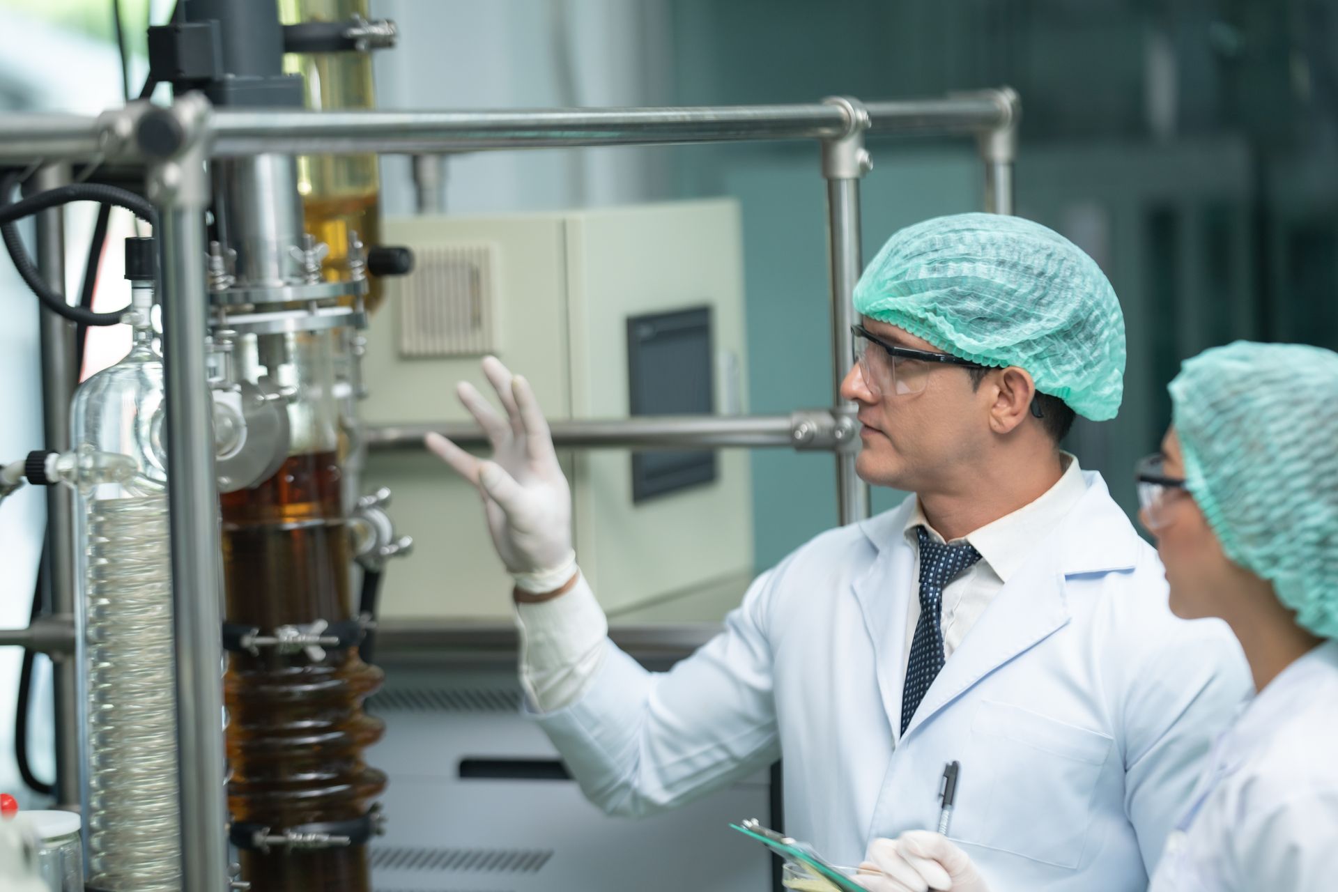 An aerial view of a man pushing a pallet truck in a warehouse.