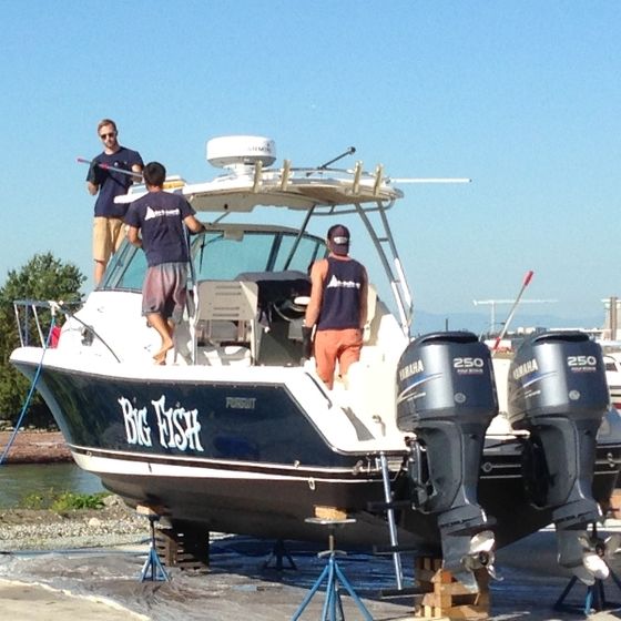 Decks Awash employees ready to clean and detail a yacht