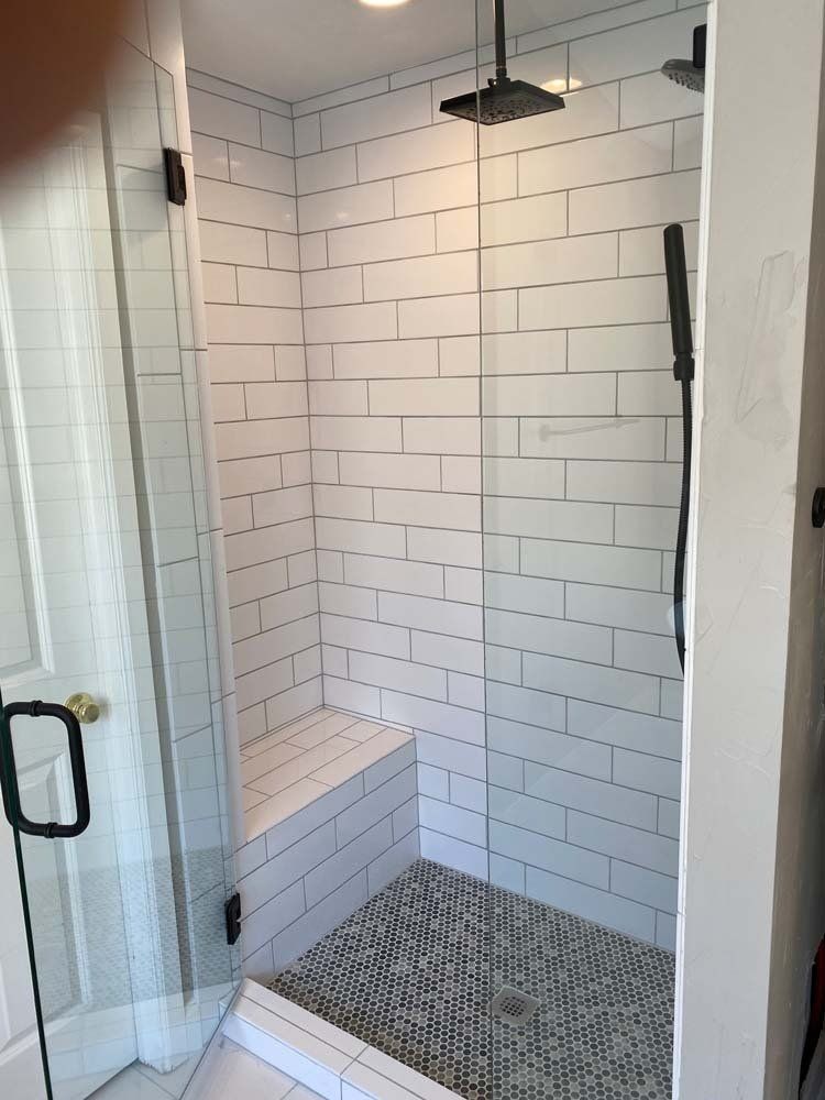 Heated Floors, Tub To Shower Conversions, Grout Free, Countertops, Cabinets, steam showers, Tile, Whole Wall Marble Shower Surrounds, Build A Bath & Kitchen