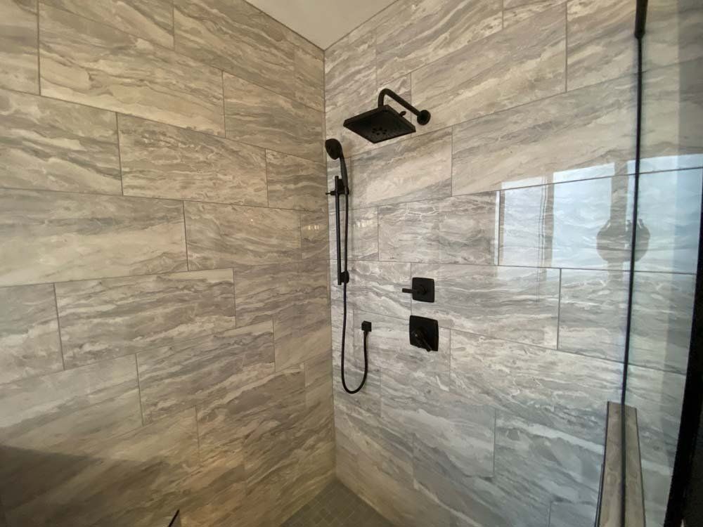 Heated Floors, Tub To Shower Conversions, Grout Free, Countertops, Cabinets, steam showers, Tile, Whole Wall Marble Shower Surrounds, Build A Bath & Kitchen