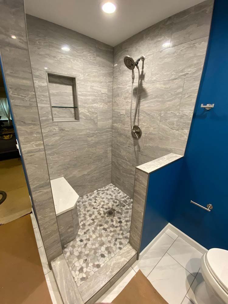 Heated Floors, Tub To Shower Conversions, Grout Free, Countertops, Cabinets, steam showers, Tile, Whole Wall Marble Shower Surrounds, Build A Bath & Kitchen