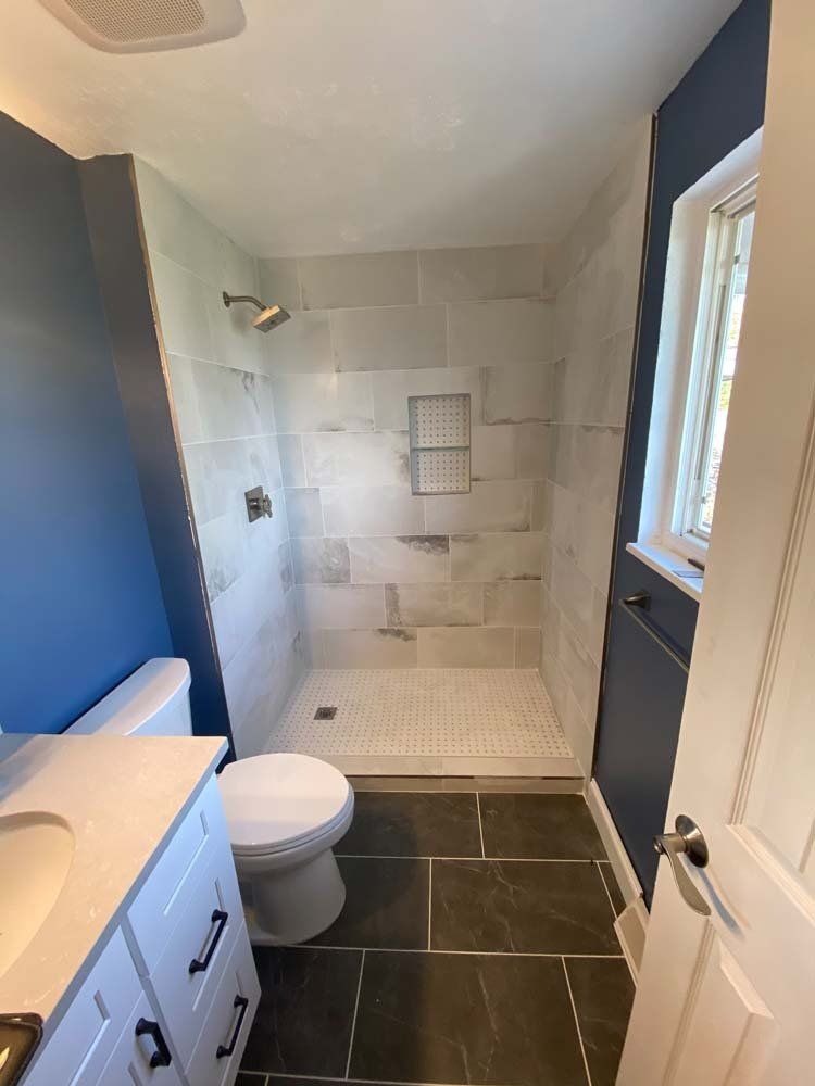 Heated Floors, Tub To Shower Conversions, Grout Free, Countertops, Cabinets, steam showers, Tile, Whole Wall Marble Shower Surrounds, Build A Bath & Kitchen