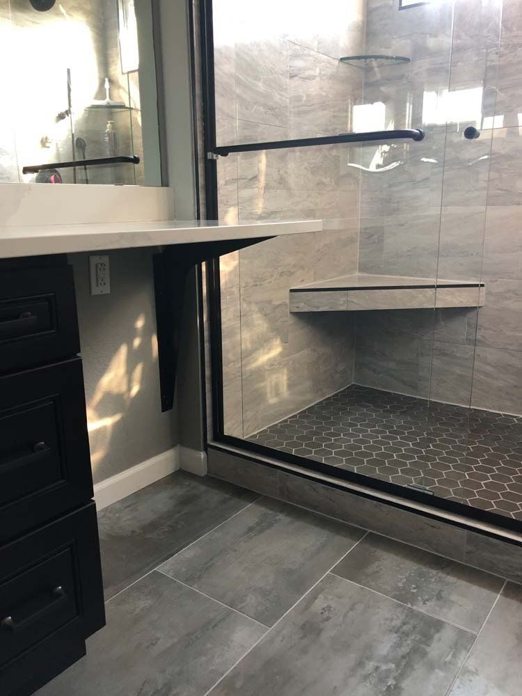 Heated Floors, Tub To Shower Conversions, Grout Free, Countertops, Cabinets, steam showers, Tile, Whole Wall Marble Shower Surrounds, Build A Bath & Kitchen