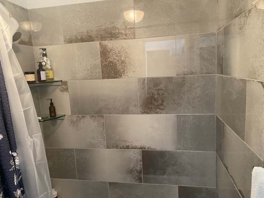 Heated Floors, Tub To Shower Conversions, Grout Free, Countertops, Cabinets, steam showers, Tile, Whole Wall Marble Shower Surrounds, Build A Bath & Kitchen