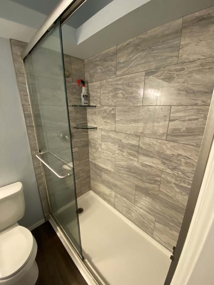 Heated Floors, Tub To Shower Conversions, Grout Free, Countertops, Cabinets, steam showers, Tile, Whole Wall Marble Shower Surrounds, Build A Bath & Kitchen