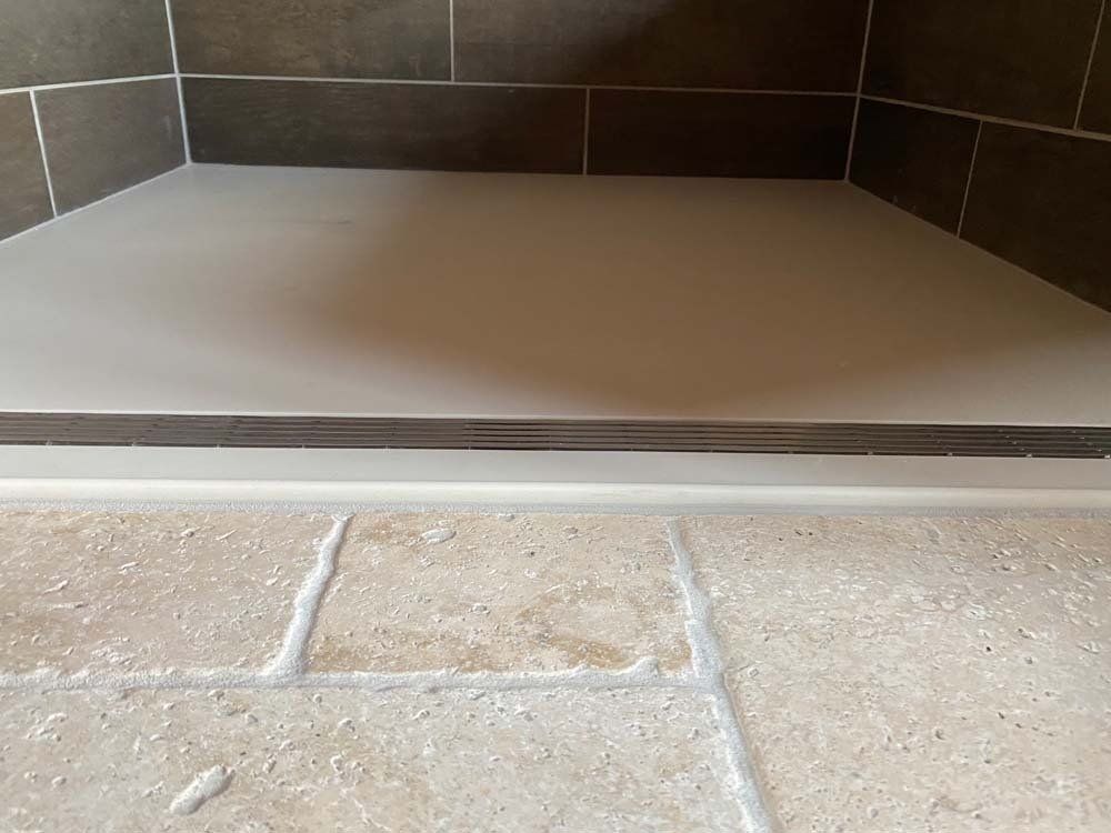 Heated Floors, Tub To Shower Conversions, Grout Free, Countertops, Cabinets, steam showers, Tile, Whole Wall Marble Shower Surrounds, Build A Bath & Kitchen