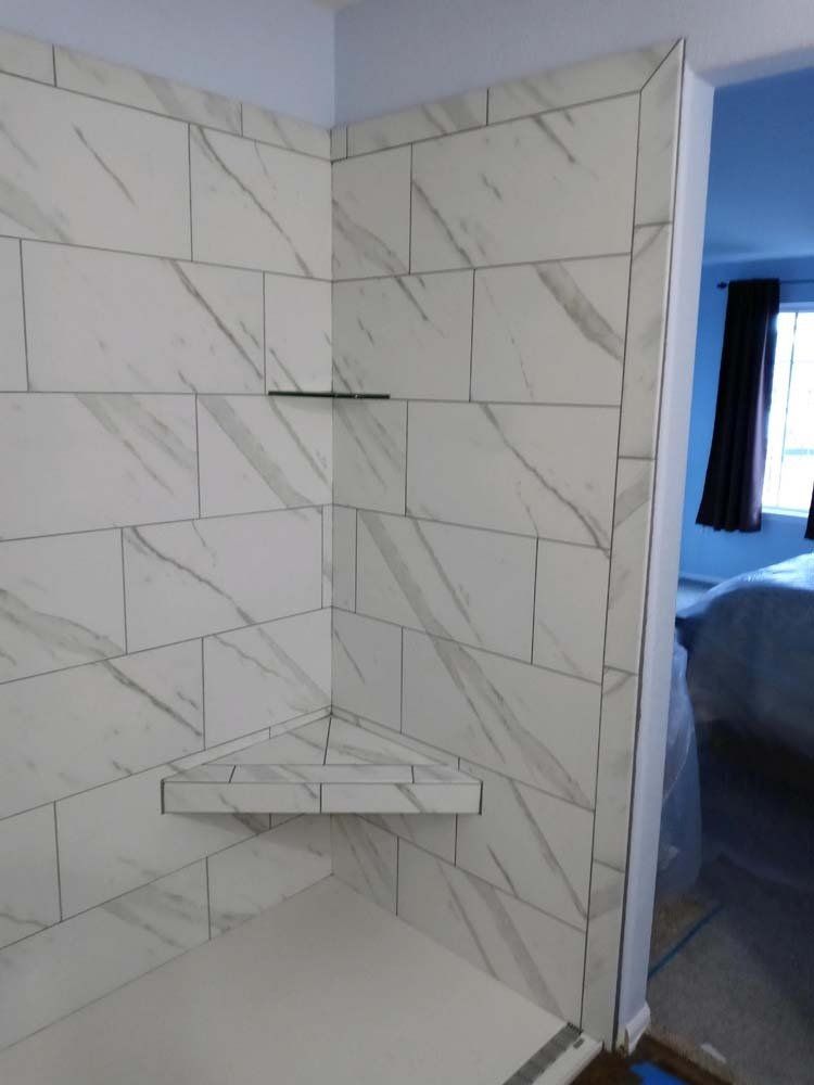 Heated Floors, Tub To Shower Conversions, Grout Free, Countertops, Cabinets, steam showers, Tile, Whole Wall Marble Shower Surrounds, Build A Bath & Kitchen