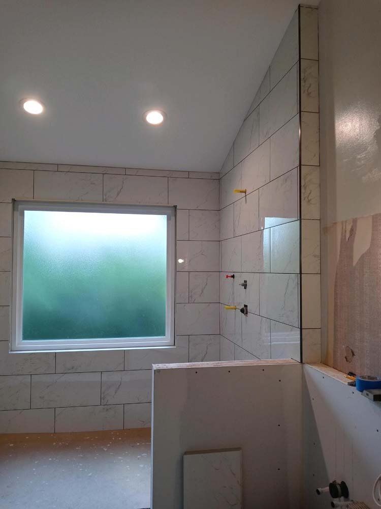 Heated Floors, Tub To Shower Conversions, Grout Free, Countertops, Cabinets, steam showers, Tile, Whole Wall MarblHeated Floors, Tub To Shower Conversions, Grout Free, Countertops, Cabinets, steam showers, Tile, Whole Wall Marble Shower Surrounds, Build A Bath & Kitchene Shower Surrounds, Build A Bath & Kitchen