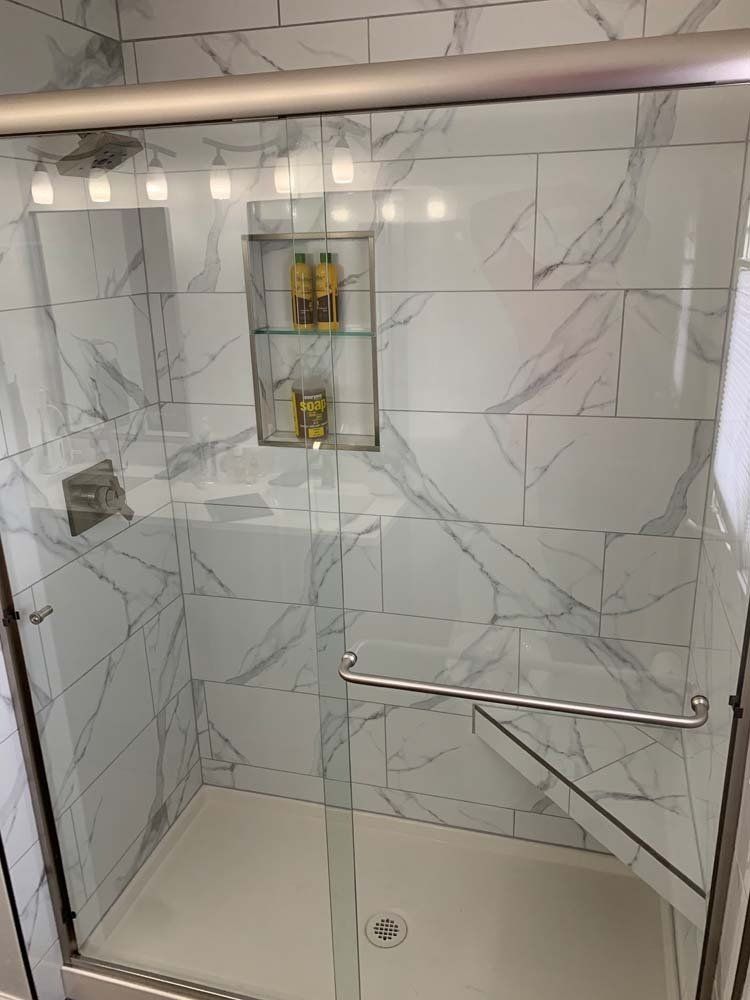 Heated Floors, Tub To Shower Conversions, Grout Free, Countertops, Cabinets, steam showers, Tile, Whole Wall Marble Shower Surrounds, Build A Bath & Kitchen
