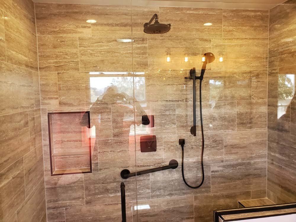 Heated Floors, Tub To Shower Conversions, Grout Free, Countertops, Cabinets, steam showers, Tile, Whole Wall Marble Shower Surrounds, Build A Bath & Kitchen