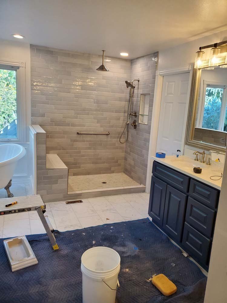 Heated Floors, Tub To Shower Conversions, Grout Free, Countertops, Cabinets, steam showers, Tile, Whole Wall Marble Shower Surrounds, Build A Bath & Kitchen