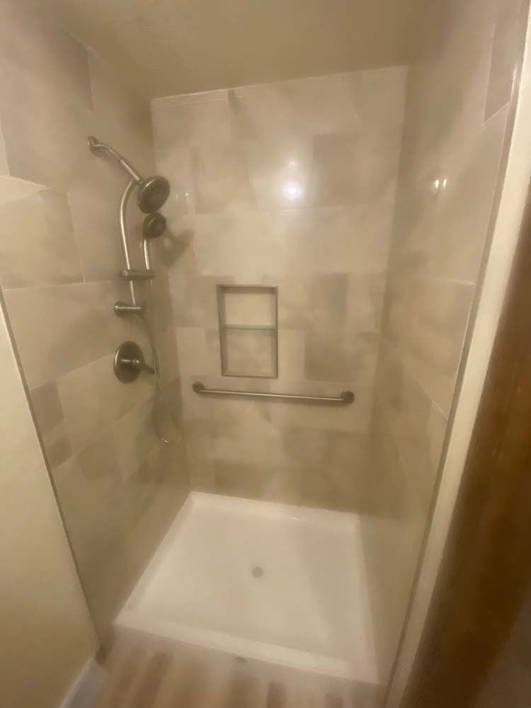 Heated Floors, Tub To Shower Conversions, Grout Free, Countertops, Cabinets, steam showers, Tile, Whole Wall Marble Shower Surrounds, Build A Bath & Kitchen