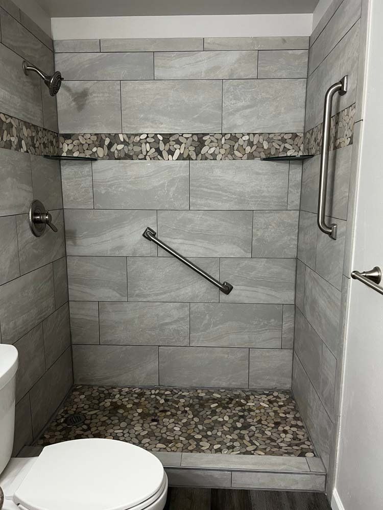 Heated Floors, Tub To Shower Conversions, Grout Free, Countertops, Cabinets, steam showers, Tile, Whole Wall Marble Shower Surrounds, Build A Bath & Kitchen