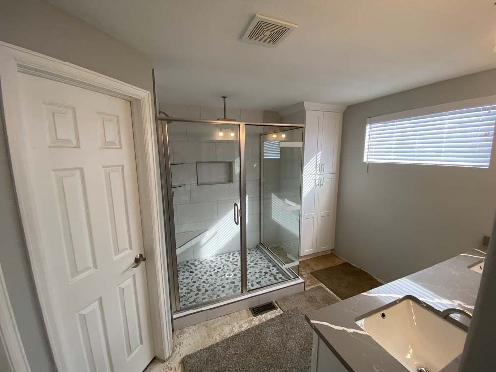 Heated Floors, Tub To Shower Conversions, Grout Free, Countertops, Cabinets, steam showers, Tile, Whole Wall Marble Shower Surrounds, Build A Bath & Kitchen
