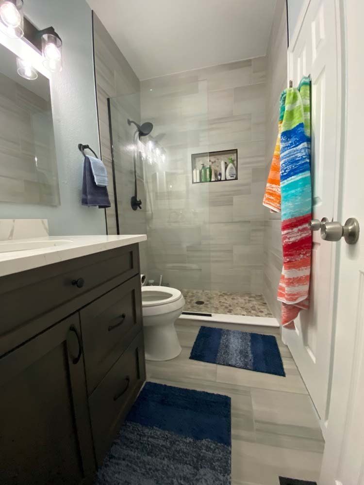 Heated Floors, Tub To Shower Conversions, Grout Free, Countertops, Cabinets, steam showers, Tile, Whole Wall Marble Shower Surrounds, Build A Bath & Kitchen