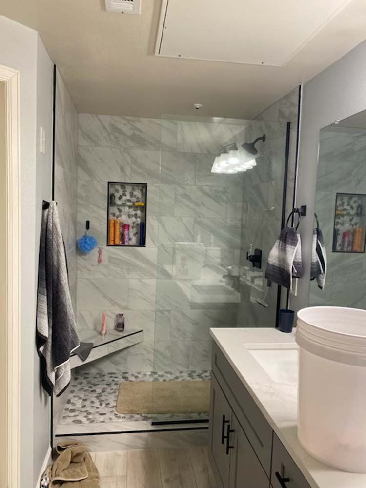 Heated Floors, Tub To Shower Conversions, Grout Free, Countertops, Cabinets, steam showers, Tile, Whole Wall Marble Shower Surrounds, Build A Bath & Kitchen