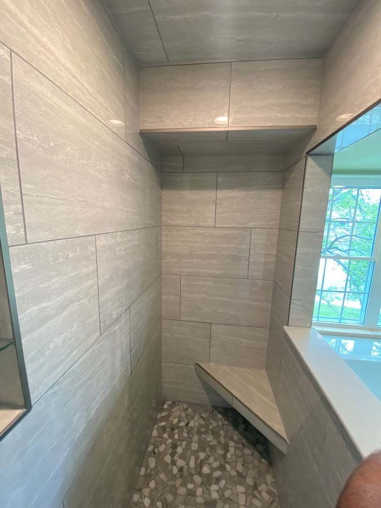 Heated Floors, Tub To Shower Conversions, Grout Free, Countertops, Cabinets, steam showers, Whole Wall Marble Shower Surrounds, Build A Bath & Kitchen