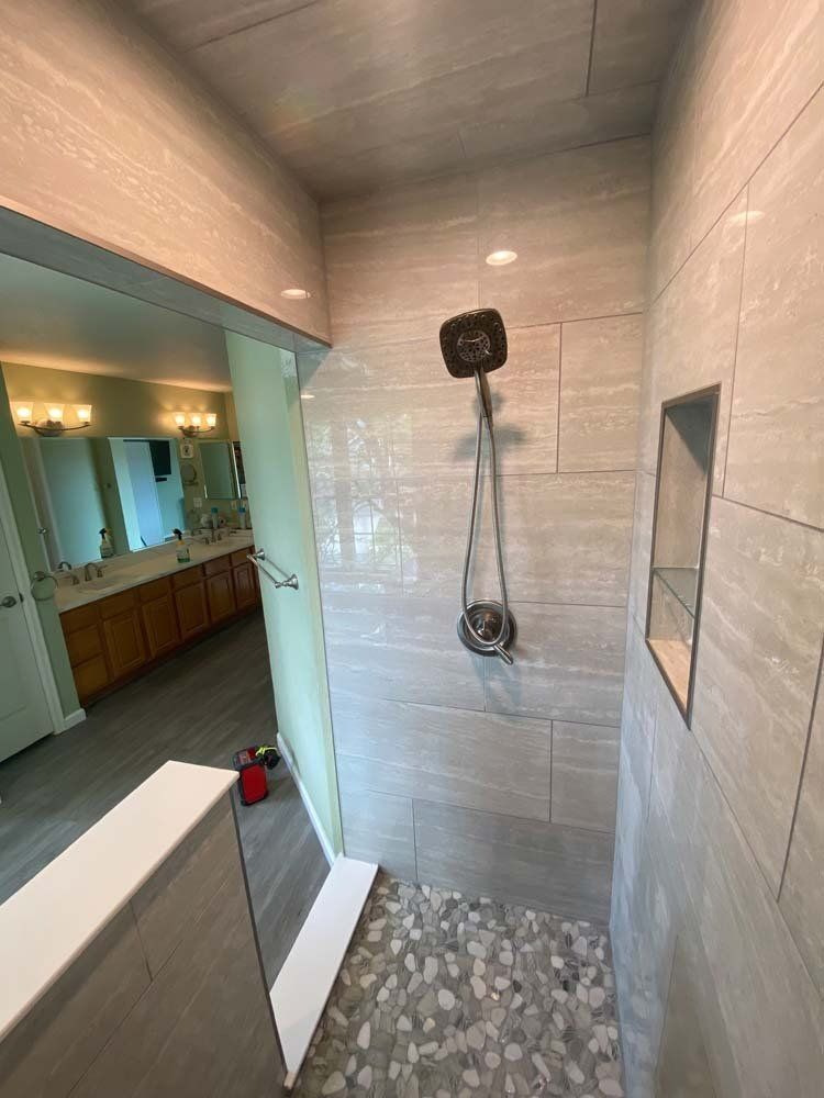 Heated Floors, Tub To Shower Conversions, Grout Free, Countertops, Cabinets, steam showers, Whole Wall Marble Shower Surrounds, Build A Bath & Kitchen