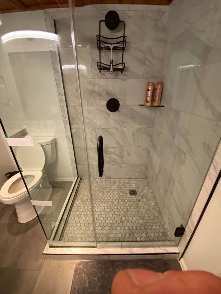 Heated Floors, Tub To Shower Conversions, Grout Free, Countertops, Cabinets, steam showers, Whole Wall Marble Shower Surrounds, Build A Bath & Kitchen