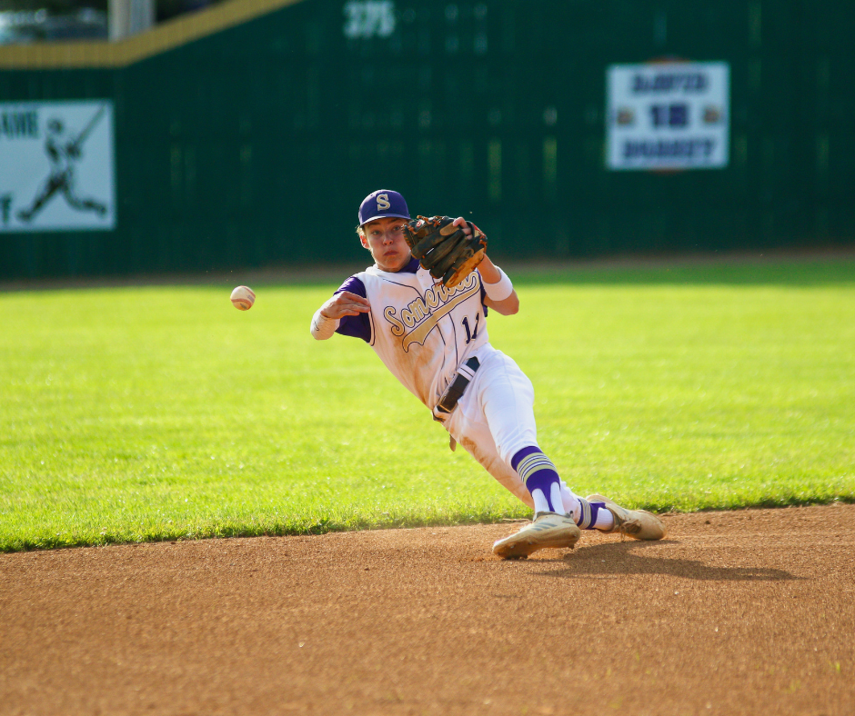 male baseball player throwing