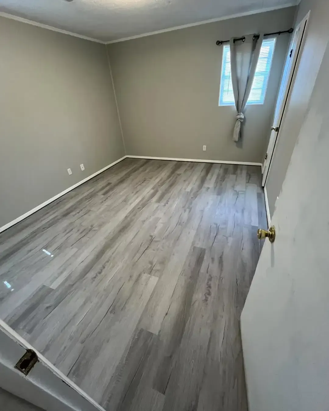After luxury vinyl plank installation service job.