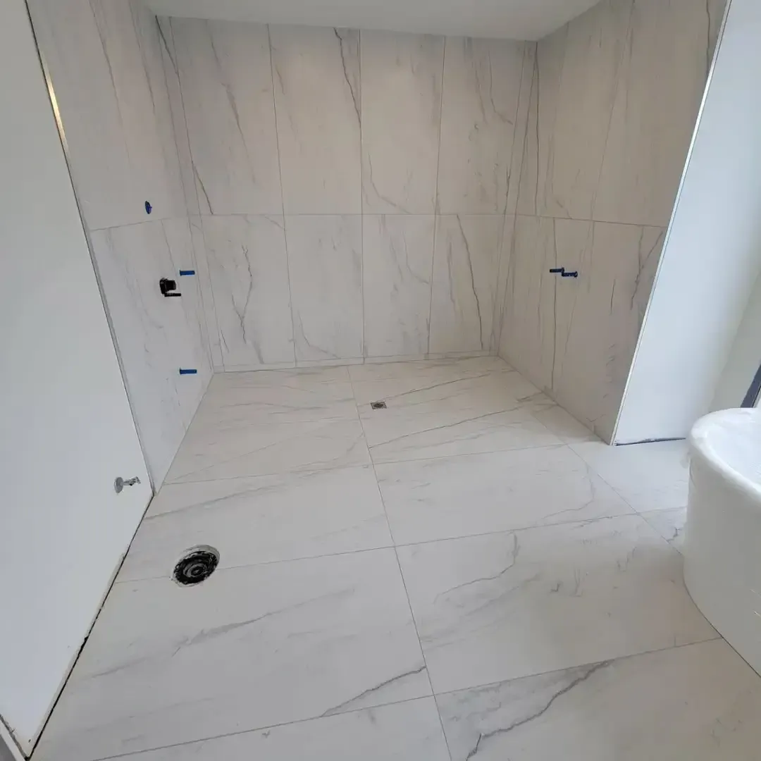 After ceramic tile flooring installation service in Denver home bathroom.