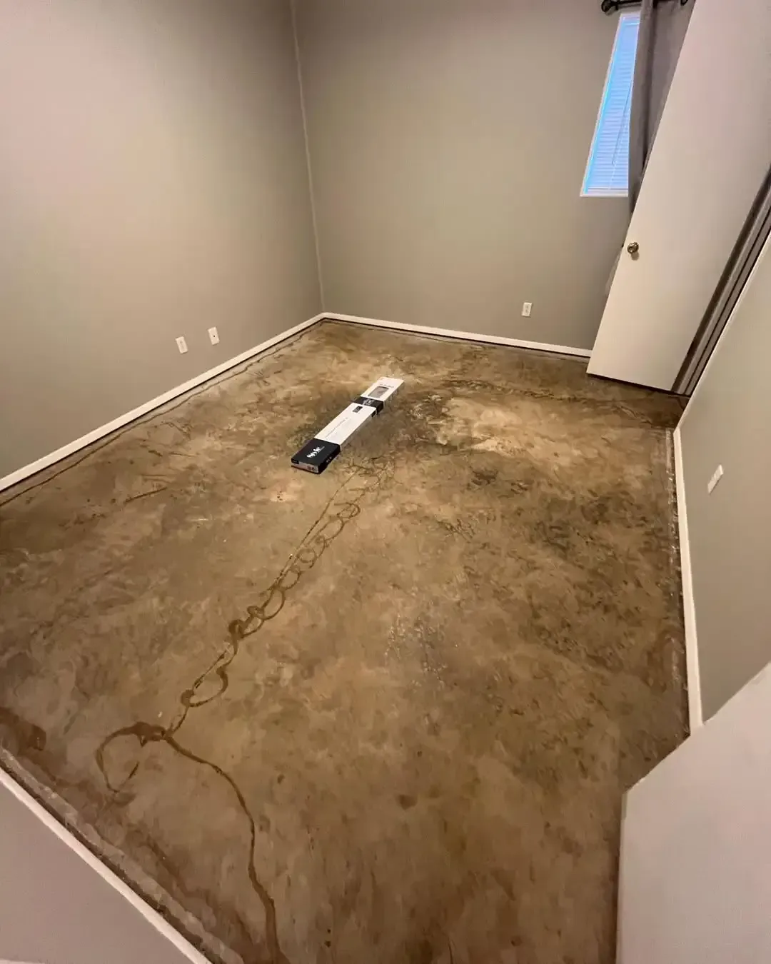 Before luxury vinyl plank installation service job.