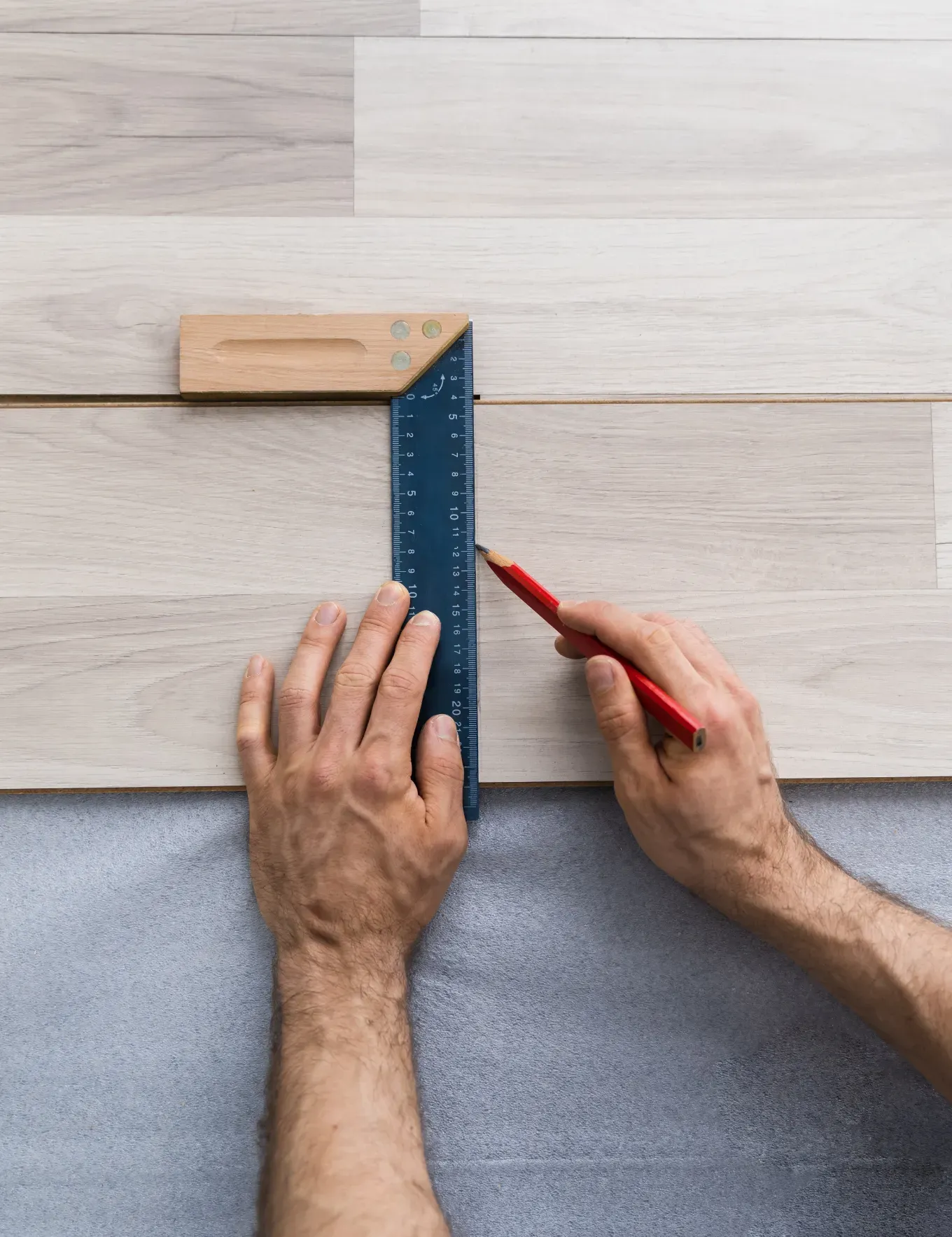 Hardwood flooring getting installed by experts at Blas Carpet in Columbus, Ohio.