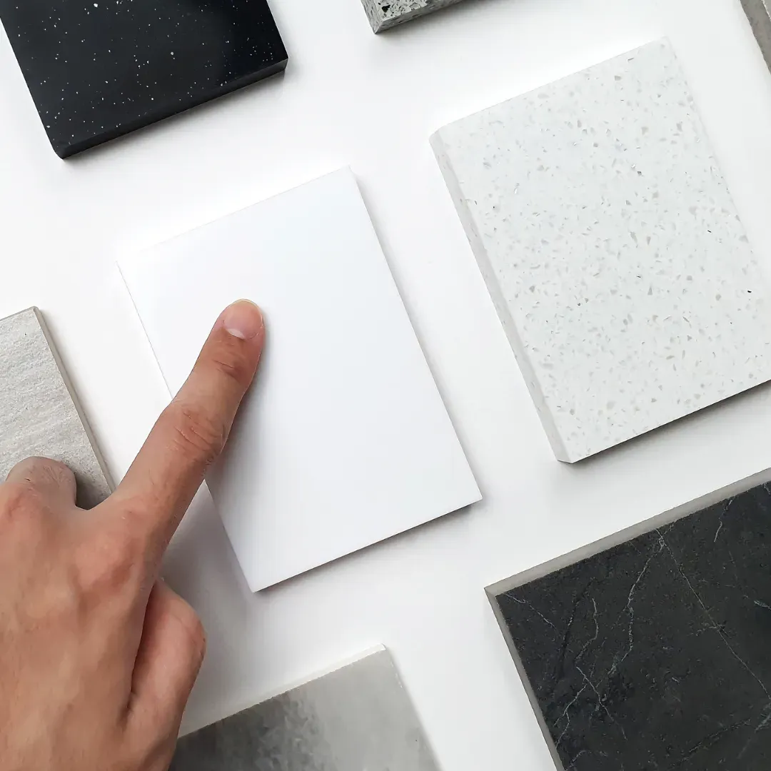 Showing client ceramic tile samples before installation.