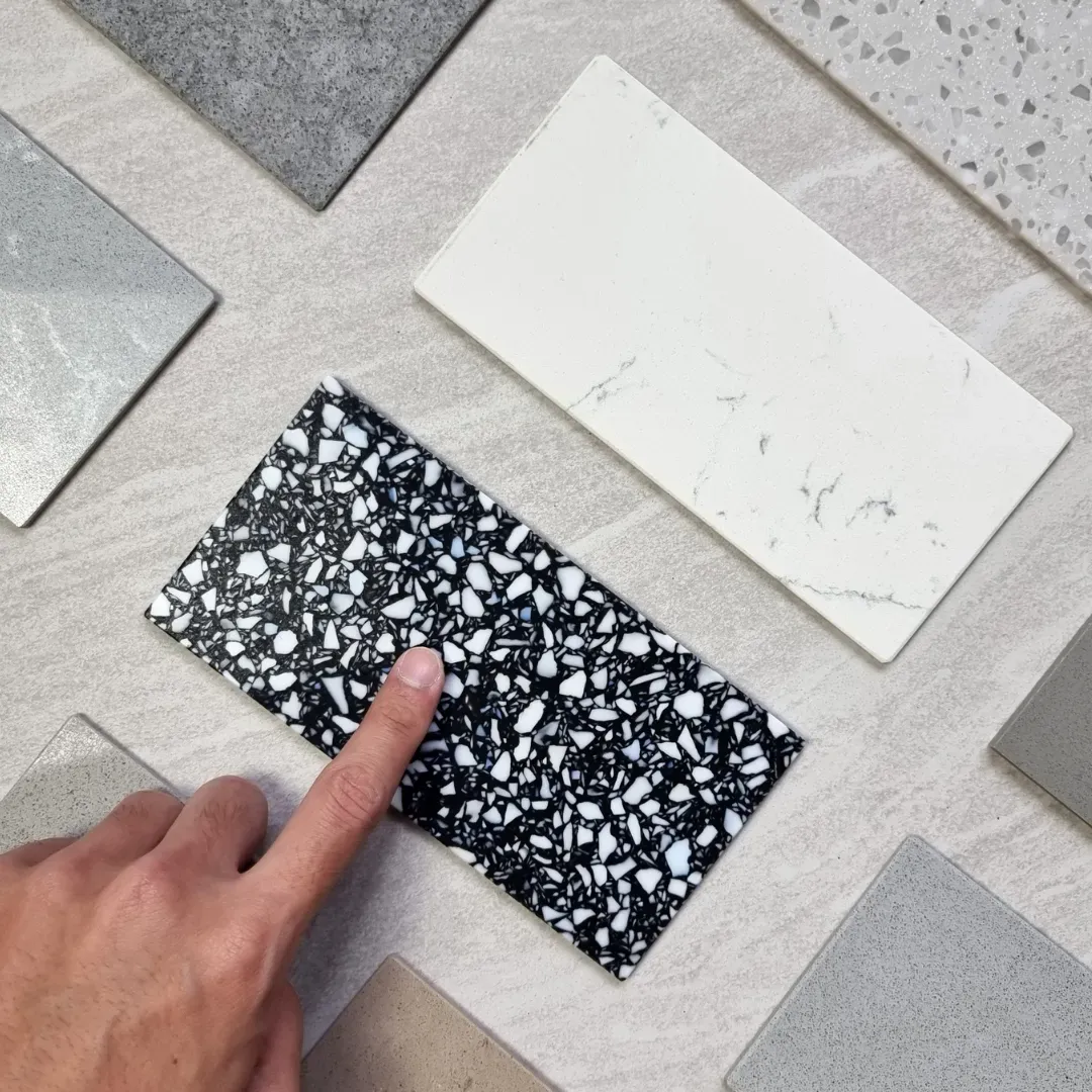 Showing customer ceramic tile samples before installation process.