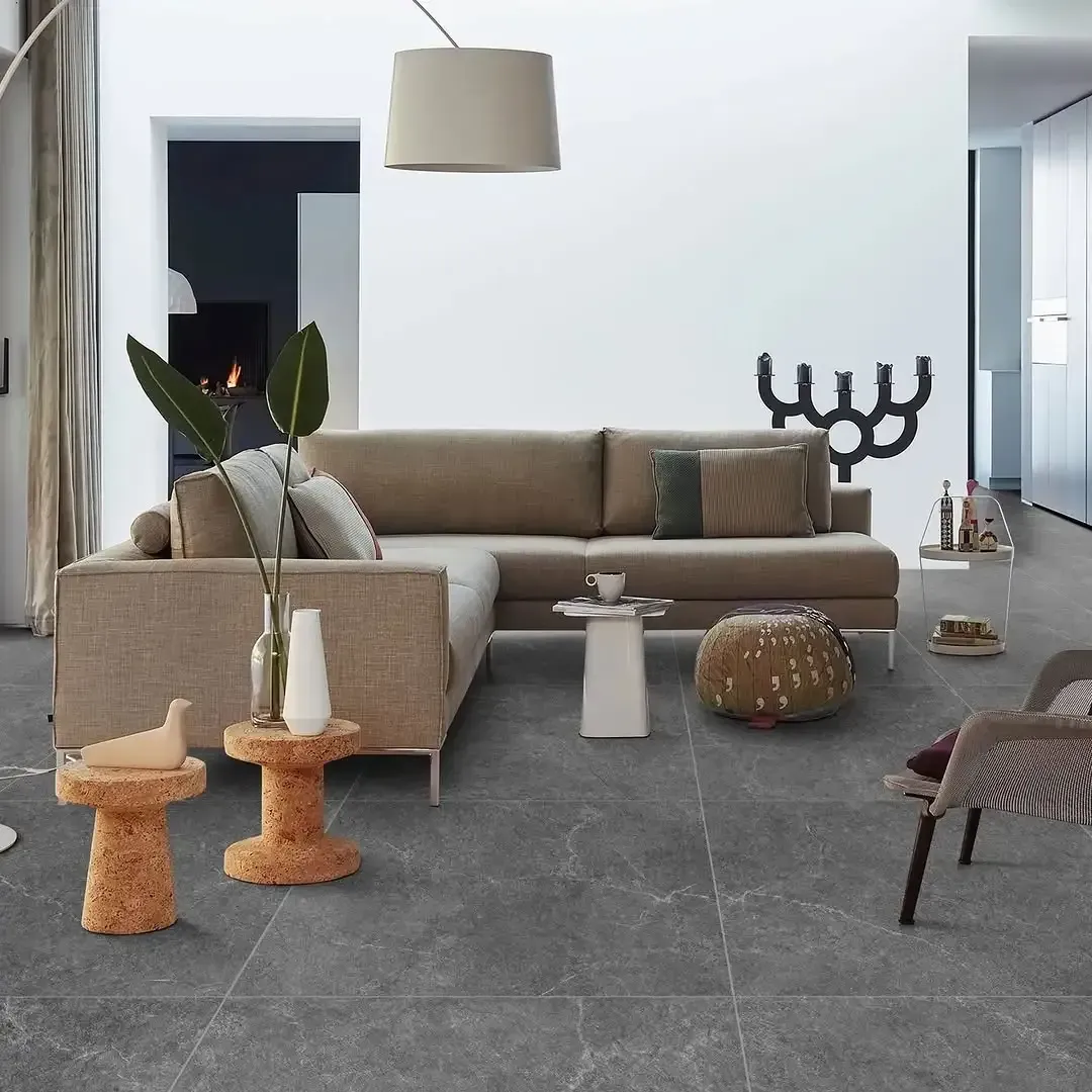 Expertly installed glazed ceramic tile floor in living room.