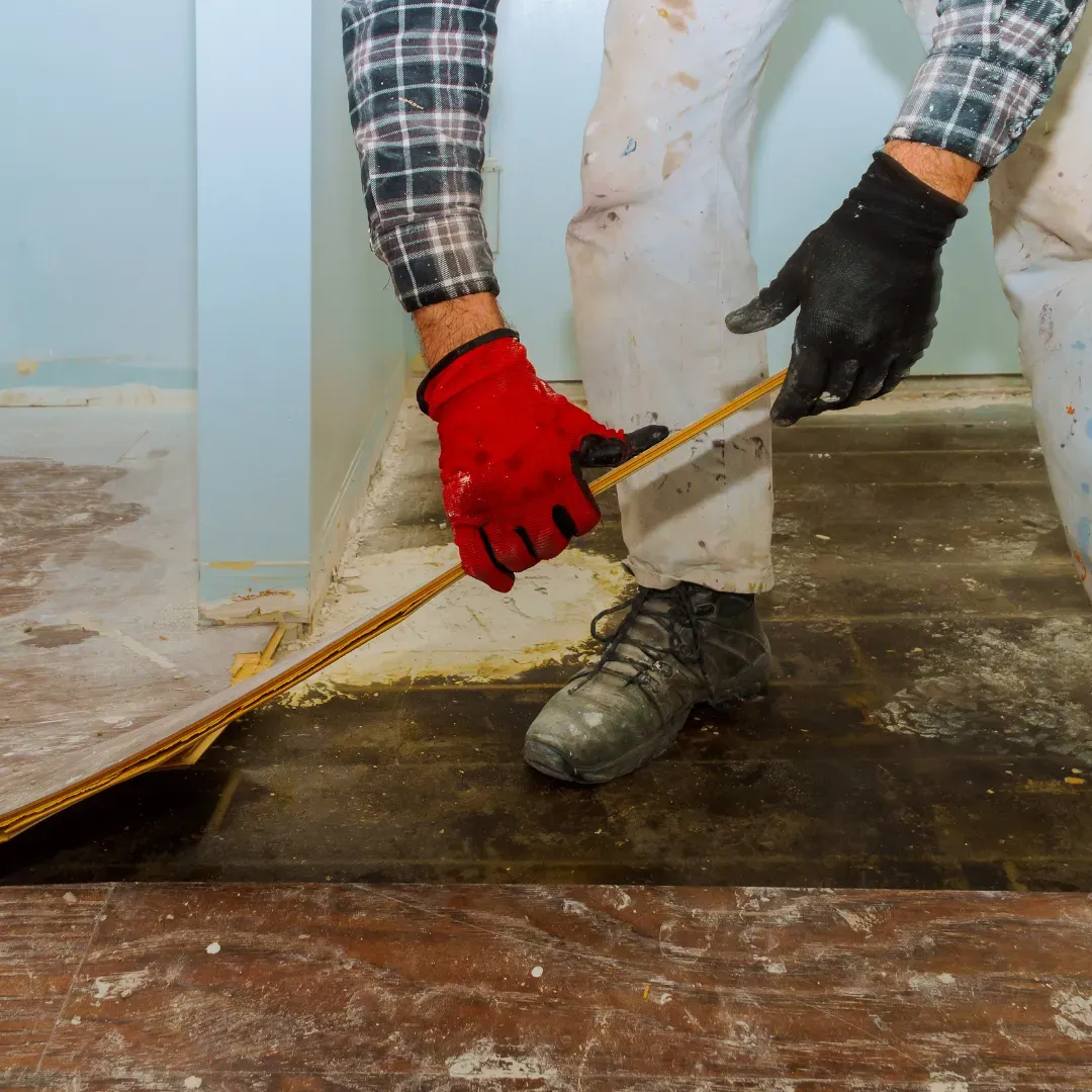 Removing old hardwood floor and replacing it with LVP flooring.