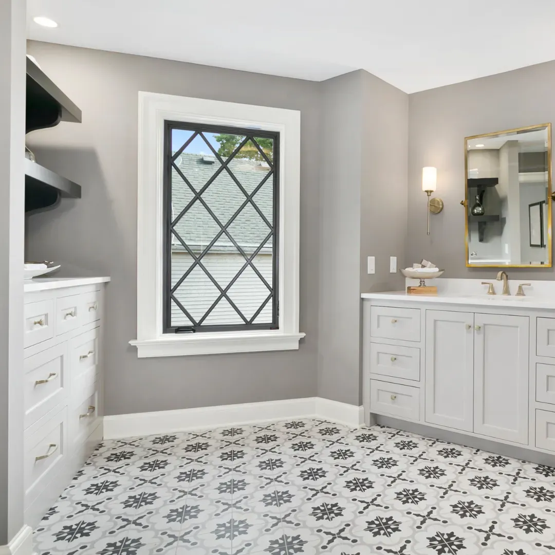 Ceramic tile flooring designs inside Atlanta homes bathroom.