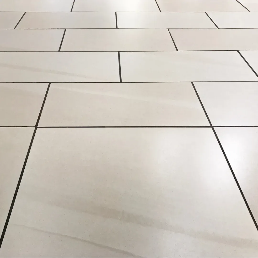 Newly cleaned tile and grout flooring.