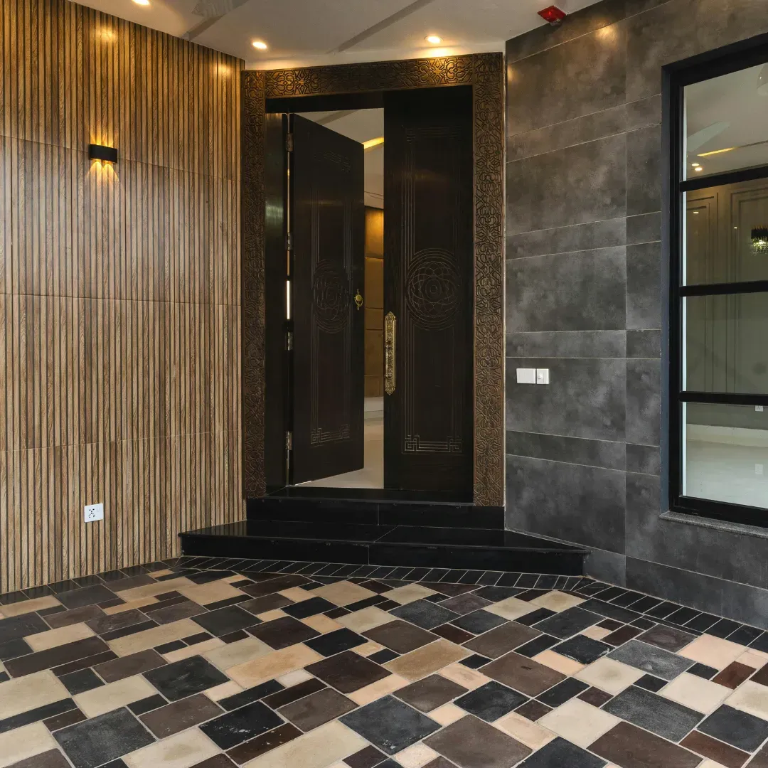 Newly installed ceramic tile flooring with patterns.