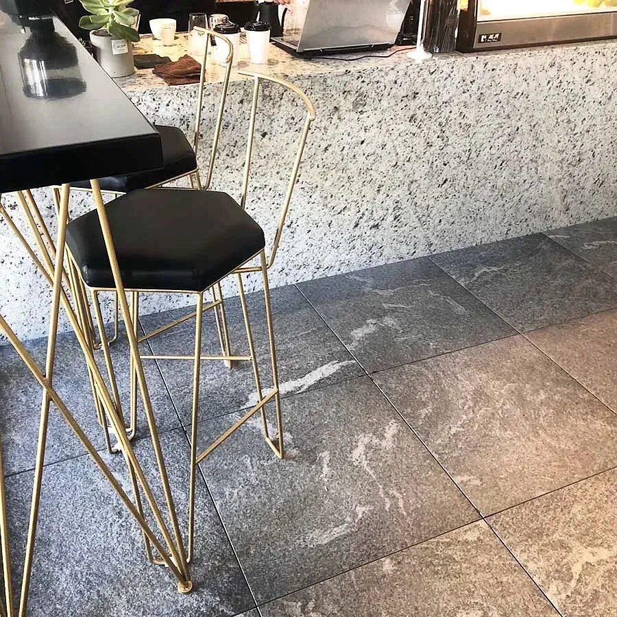 Professionally installed unglazed ceramic tile flooring installation service.