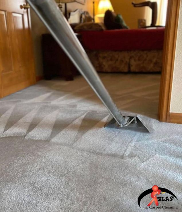 Carpet getting steam cleaned by professional company.