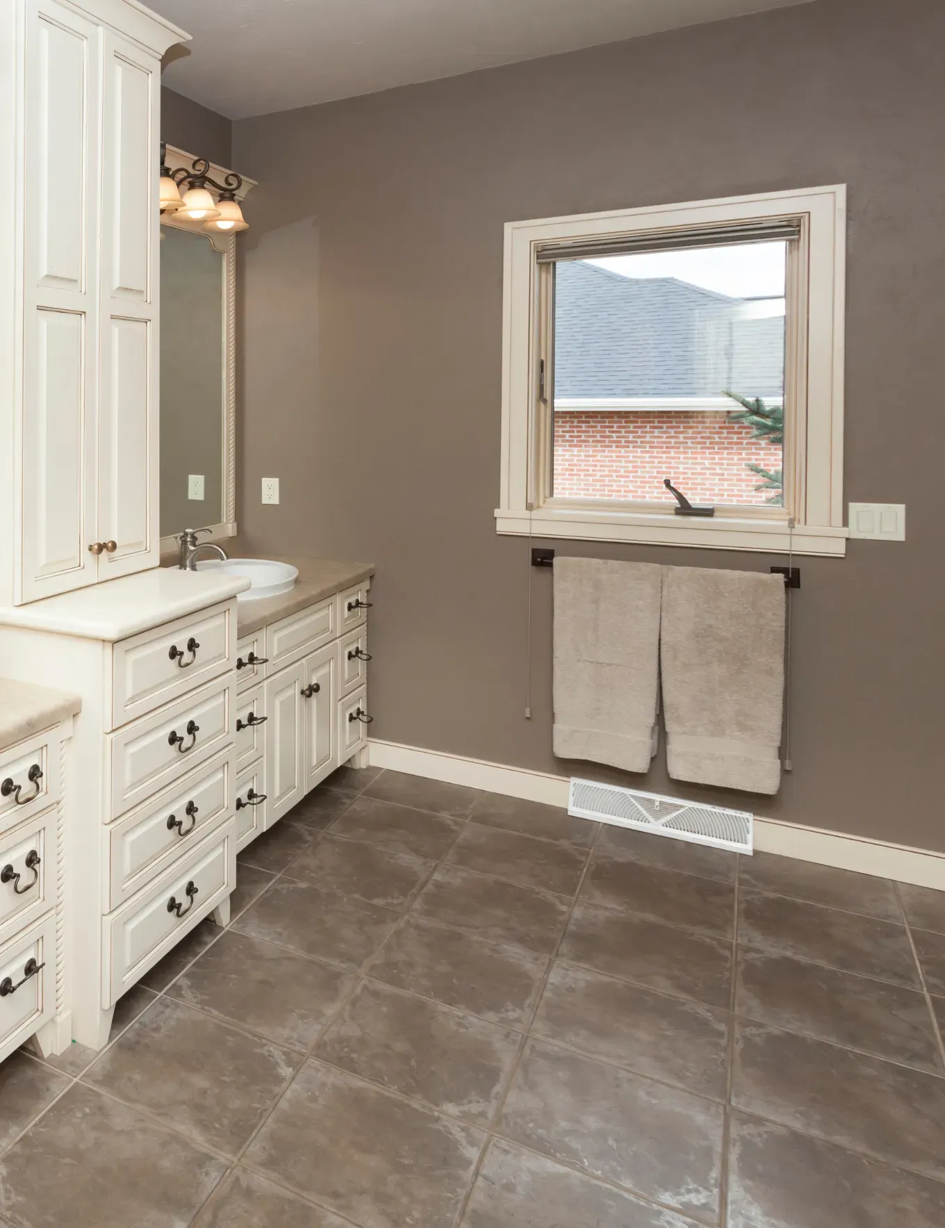 Newly installed ceramic tile flooring in Atlanta homes bathroom.