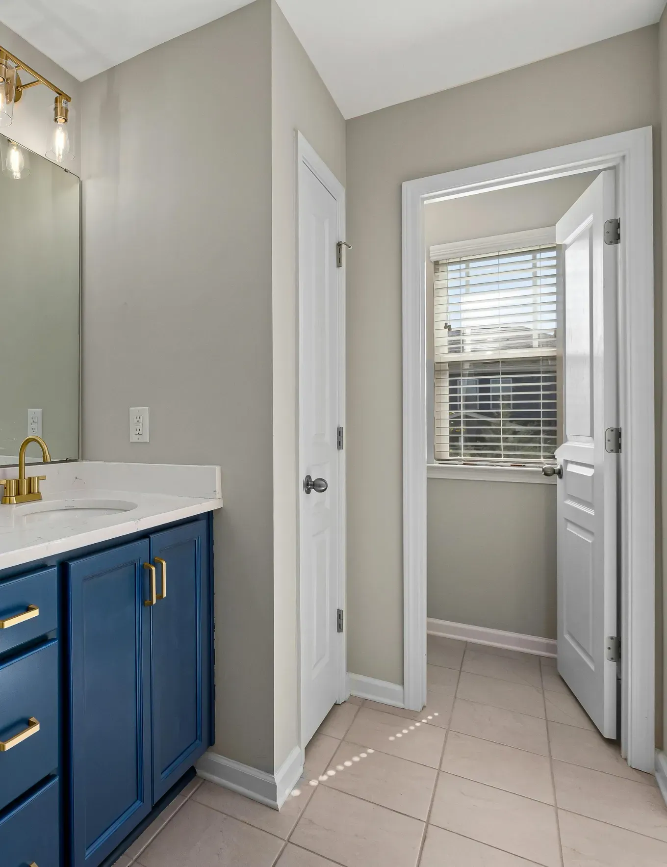 Newly installed ceramic tile floor in bathroom.
