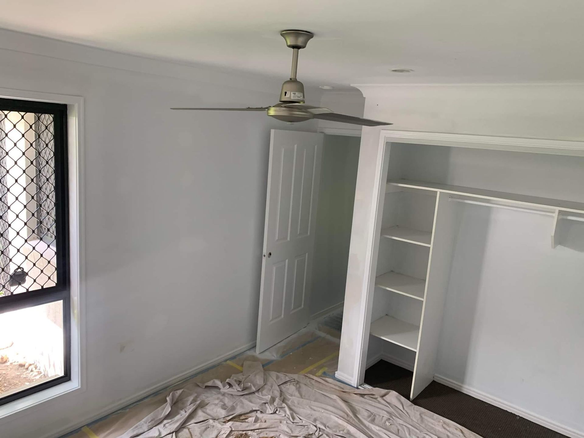 There Is A Ceiling Fan In The Corner Of The Room — LMS Painting & Maintenance Pty Ltd In Maitland, NSW