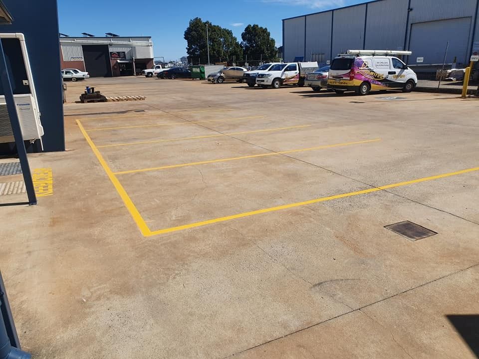 A Parking Lot With A Lot Of Cars Parked In It — LMS Painting & Maintenance Pty Ltd In Maitland, NSW