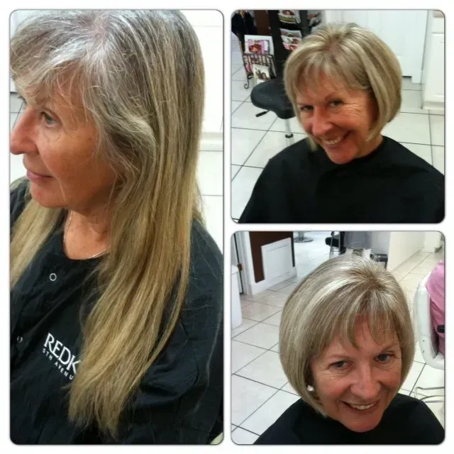 A woman in a black shirt that says redken on it