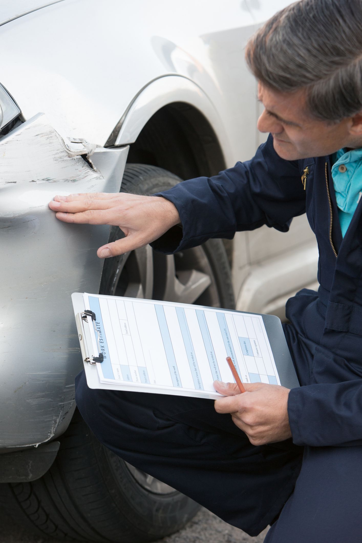Mechanic Inspecting Damage To Car — Geelong, VIC — Geelong Accident Repair