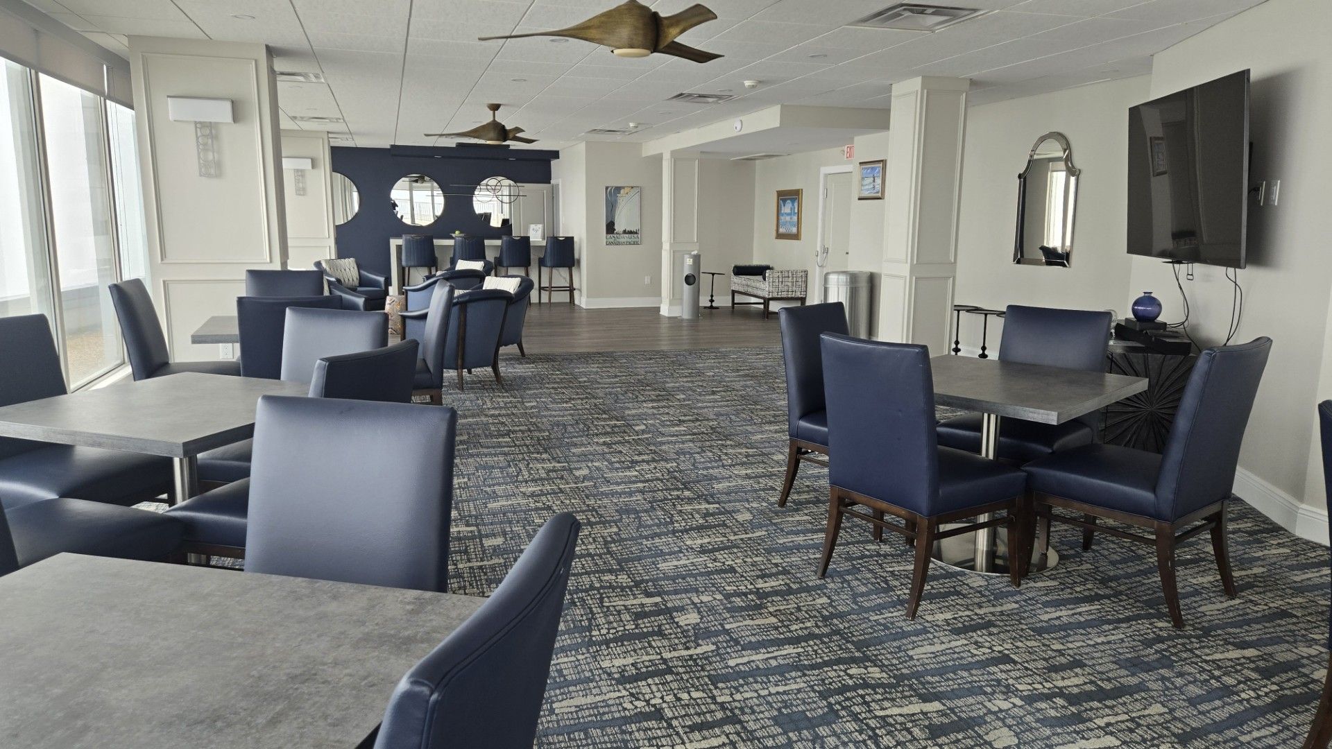 image of a party room with chairs and tables